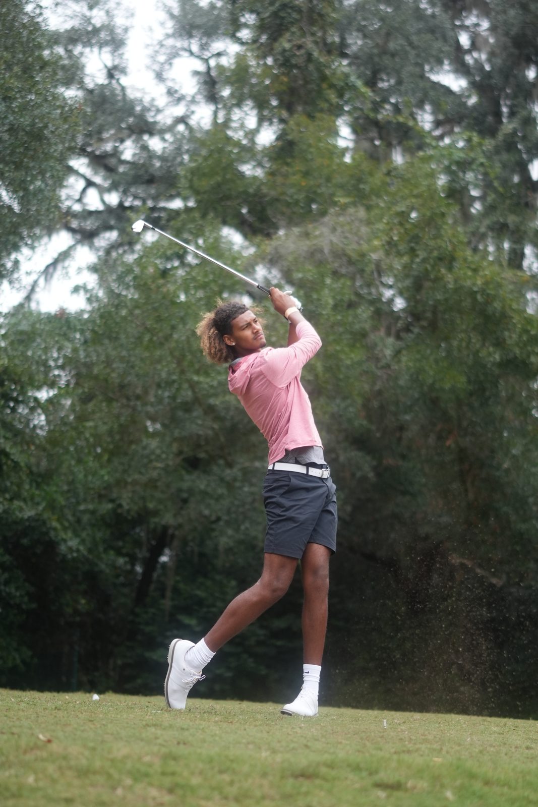 Golfer celebrating a great shot