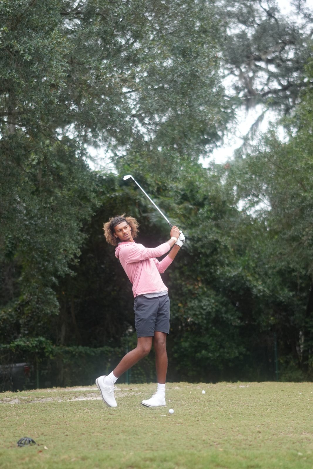 Golfer following through on a swing