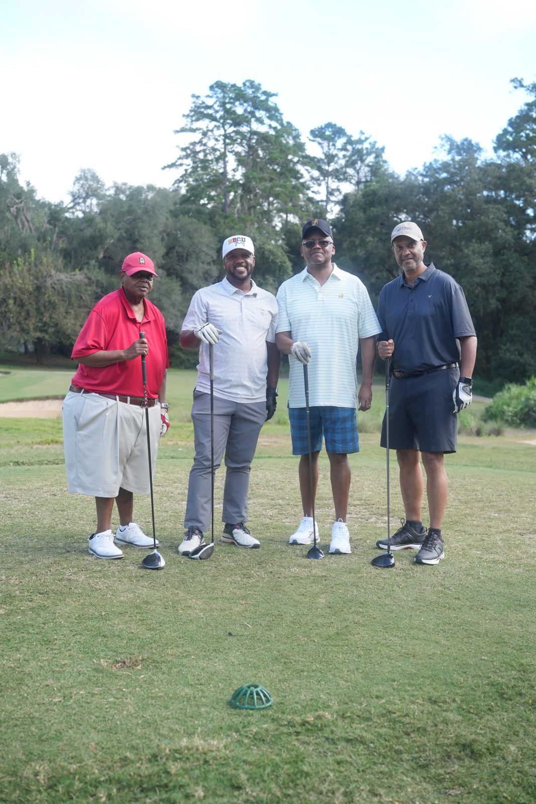 Foursome walking the course together