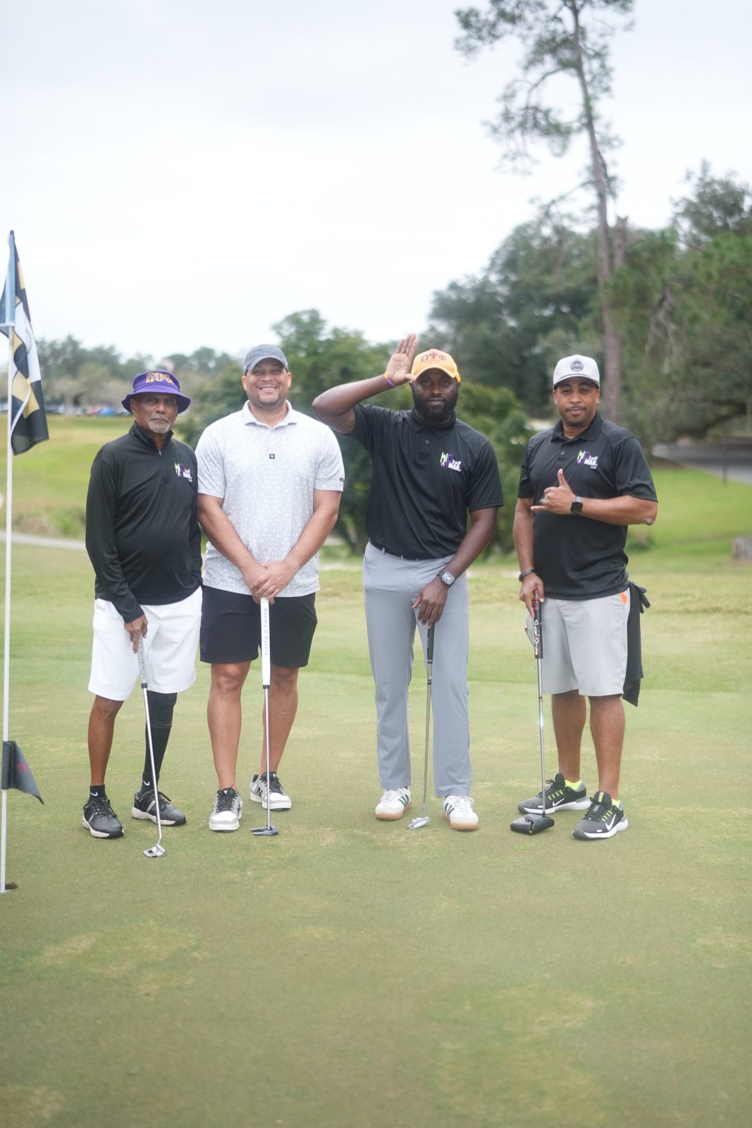 Team photo on the tee box